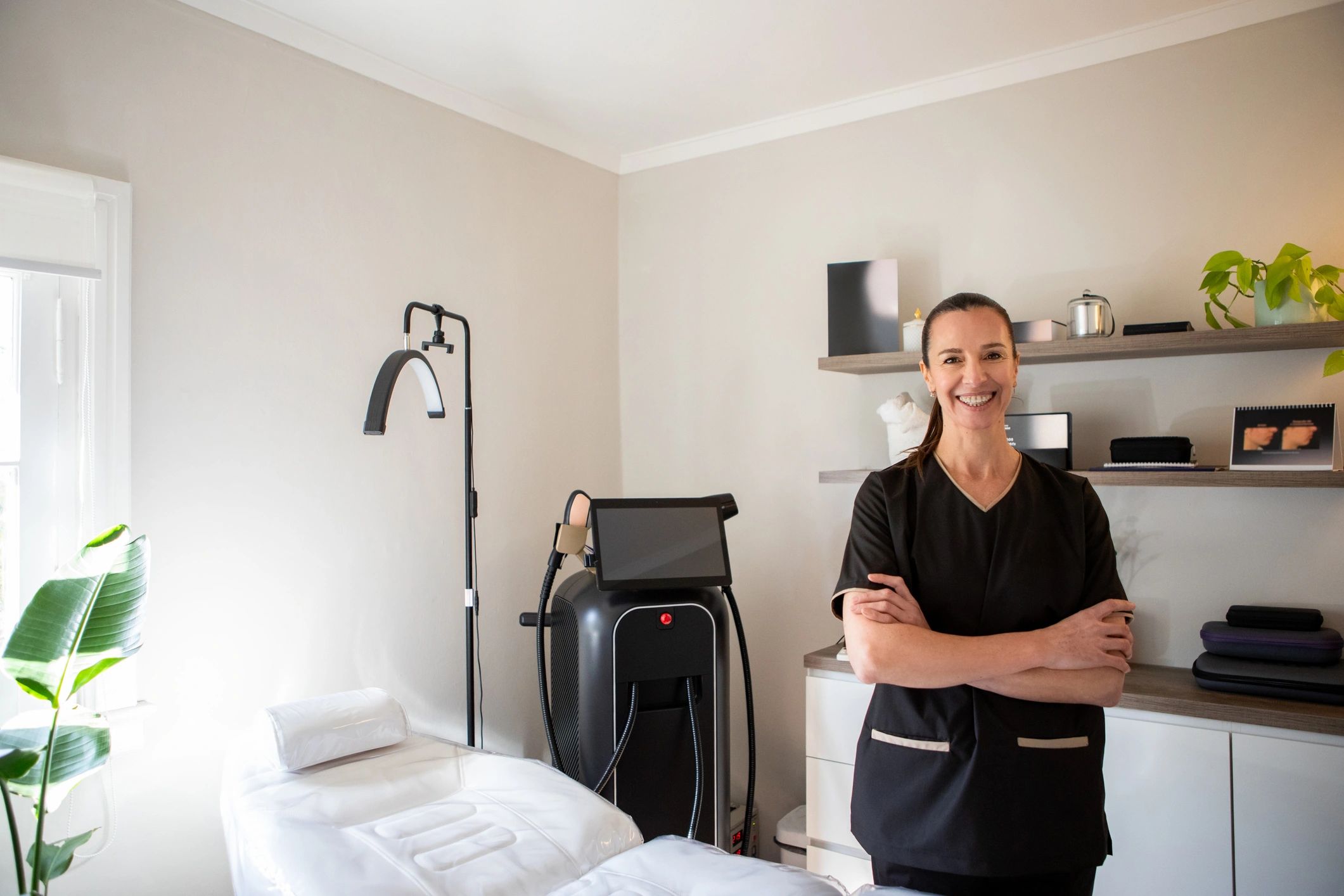 Professional providing laser skin treatment